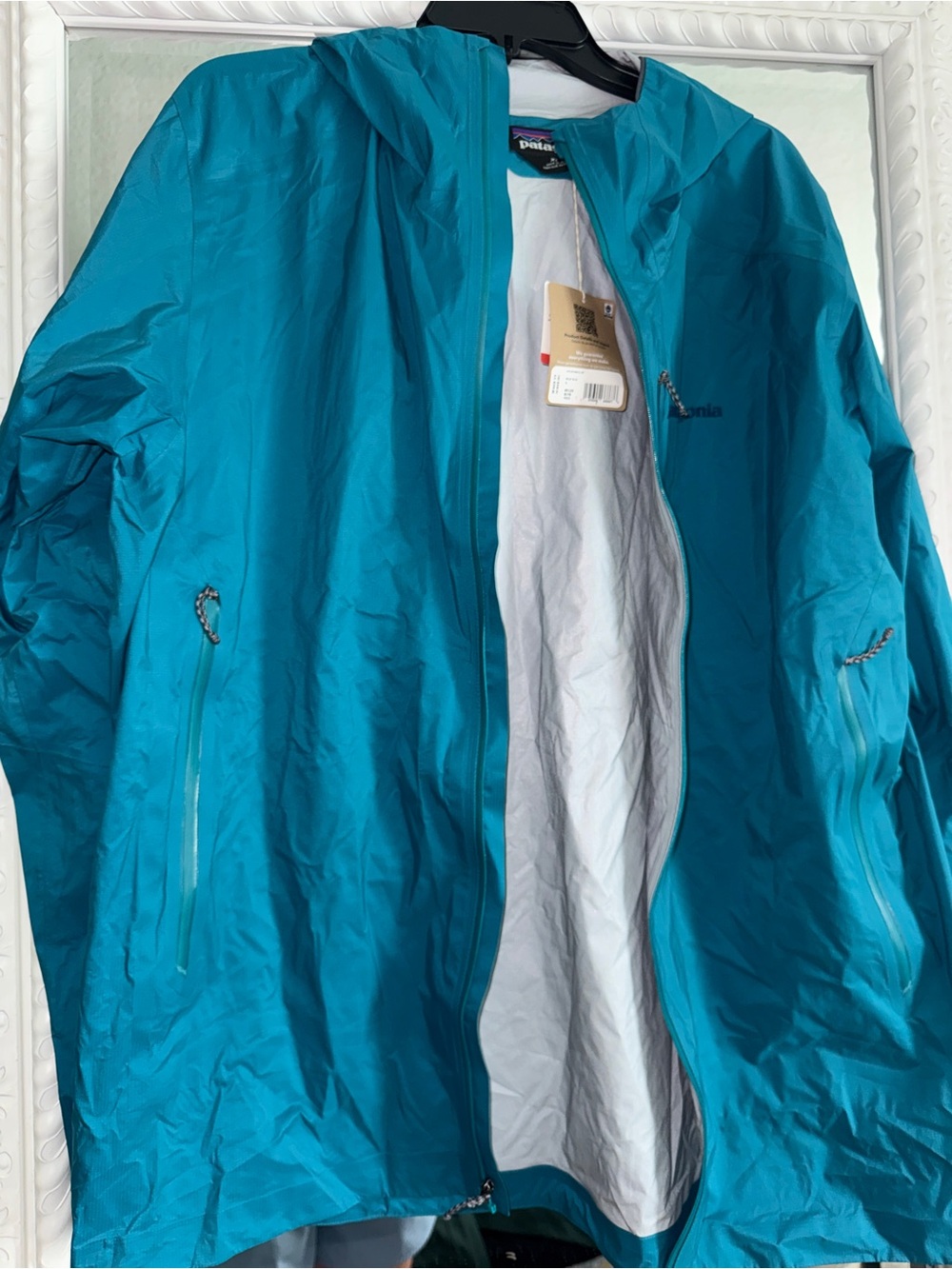 Patagonia Men’s Teal Hooded Rain Jacket